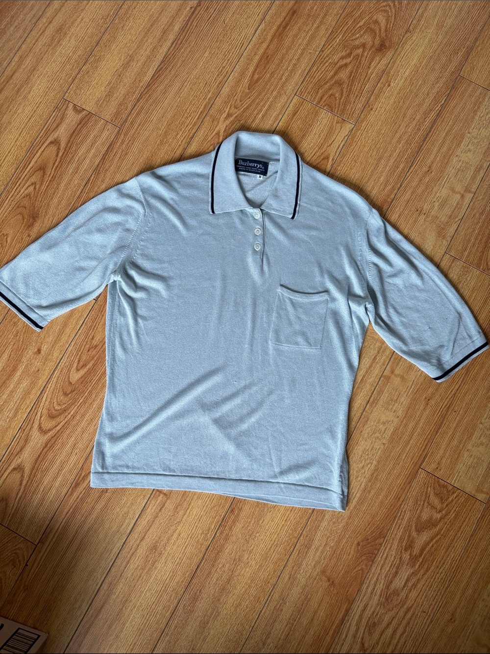 Burberrys Pale Blue knit Polo with Navy Contrast Trim 100% Pure Silk